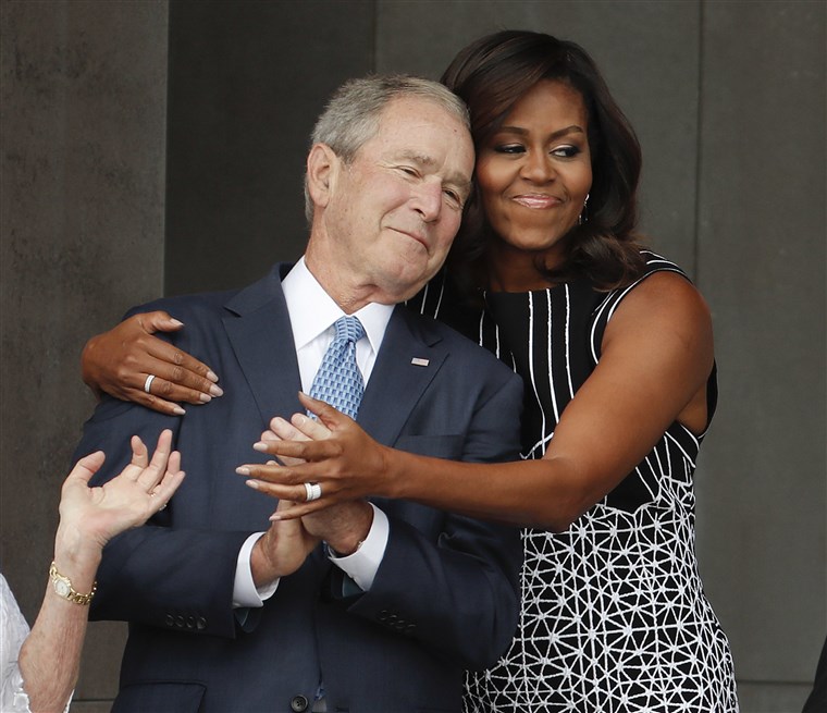 Michelle Obama hugging George W Bush